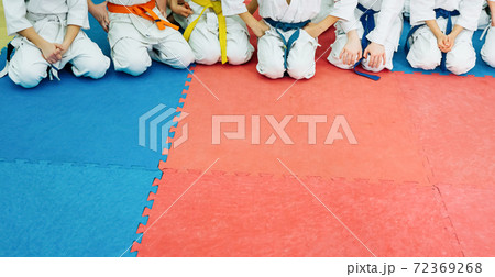 Kids training on karate-do. Banner with space for text. For web pages or advertising printing. Kids training on karate-do. Banner with space for text. For web pages or advertising printing. 72369268