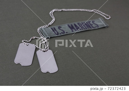 U.S. MARINES Branch Tape with dog tags on olive drab uniform 72372423