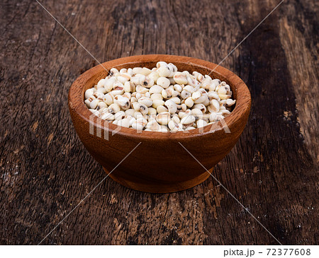 Millet in wood bowl on wooden Millet in wood bowl on wooden 72377608