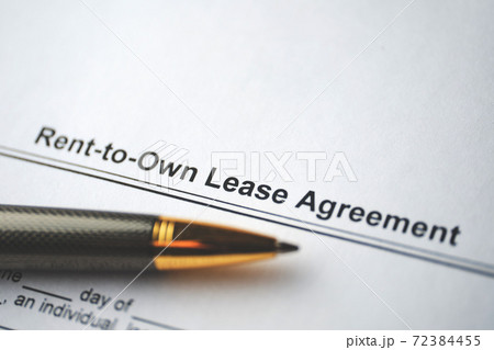 Legal document Rent-to-Own Lease Agreement on paper close up Legal document Rent-to-Own Lease Agreement on paper close up 72384455