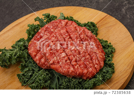 Raw beef burger cutlet for cooking 72385638