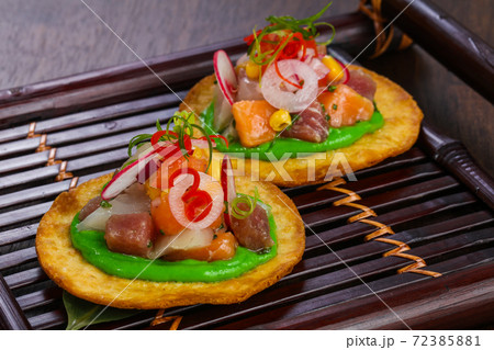 Taco with tuna and salmon 72385881