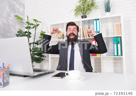 Enjoying success. Happy manger celebrate success in office. Enjoying success. Happy manger celebrate success in office. 72393140