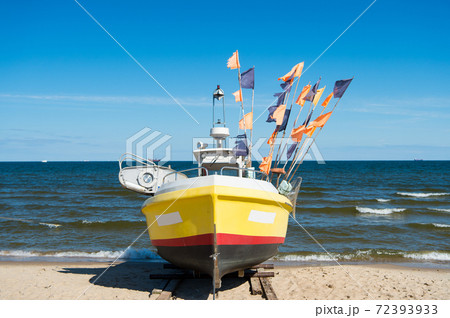 Boat or ship at moorage 72393933