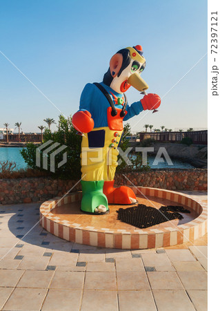 shower in the form of a clown by the pool 72397121