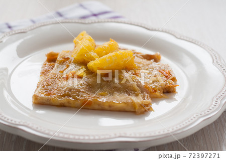 French crepes suzette crepe on a light background French crepes suzette crepe on a light background 72397271