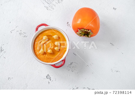 Bowl of persimmon hummus Bowl of persimmon hummus 72398114