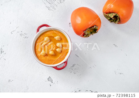 Bowl of persimmon hummus Bowl of persimmon hummus 72398115