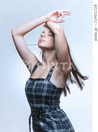 Portrait of a Teenage Girl with Long Brown Hair. 72401728