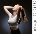 Portrait of a Teenage Girl with Long Brown Hair. 72401730
