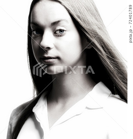 Portrait of a Teenage Girl with Long Brown Hair. 72401789
