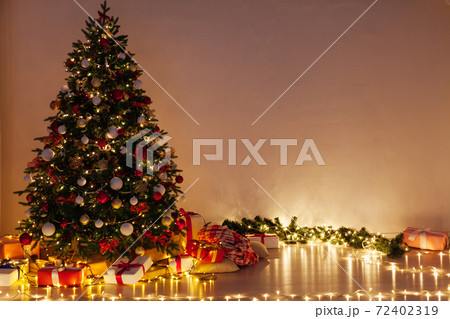 Lights garland decor Christmas tree holiday gifts new year background Lights garland decor Christmas tree holiday gifts new year background 72402319