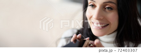 Woman uses voice dialing in smartphone closeup Woman uses voice dialing in smartphone closeup 72403307