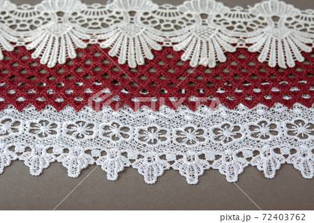pile of red, white. beige gentle luxury quality guipure 72403762