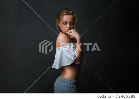 Portrait of a beautiful, attractive blonde woman with natural makeup on the face Portrait of a beautiful, attractive blonde woman with natural makeup on the face 72405599