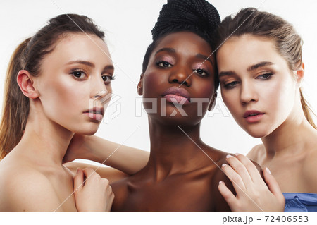 three different nation woman: african-american, caucasian together isolated on white background happy smiling, diverse type on skin, lifestyle real people concept three different nation woman: african-american, caucasian together isolated on white background happy smiling, diverse type on skin, lifestyle real people concept 72406553