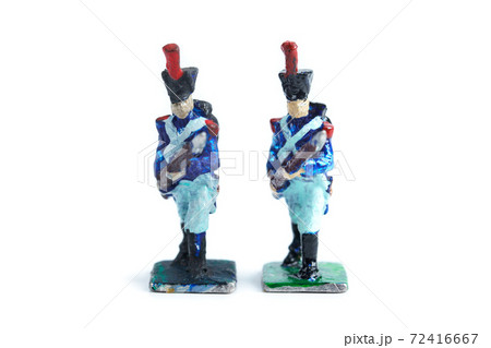 Image of handmade vintage tin soldiers on the white background 72416667