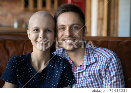 Head shot portrait smiling sick woman and man hugging Head shot portrait smiling sick woman and man hugging 72418332