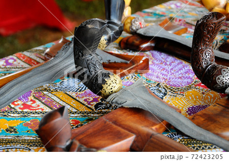 SEREMBAN, MALAYSIA -MAY 01, 2017: Keris is a traditional weapon of the Malay community in Malaysia. Made manually by using the selected iron. The handle is made of wood or ivory. SEREMBAN, MALAYSIA -MAY 01, 2017: Keris is a traditional weapon of the Malay community in Malaysia. Made manually by using the selected iron. The handle is made of wood or ivory. 72423205