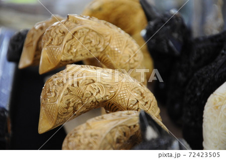 SEREMBAN, MALAYSIA -MAY 01, 2017: Kris Holders made of wood and ivory. It is  designed to hold kris blade, the traditional weapon of the Malay in Malaysia.  72423505
