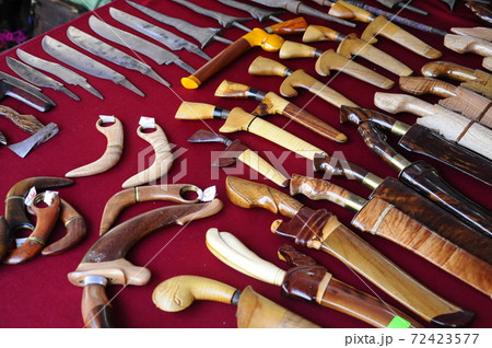 SEREMBAN, MALAYSIA -MAY 01, 2017: Group of traditional malay weapons such as kris, parang and dagger. Traditionally hand made. SEREMBAN, MALAYSIA -MAY 01, 2017: Group of traditional malay weapons such as kris, parang and dagger. Traditionally hand made. 72423577