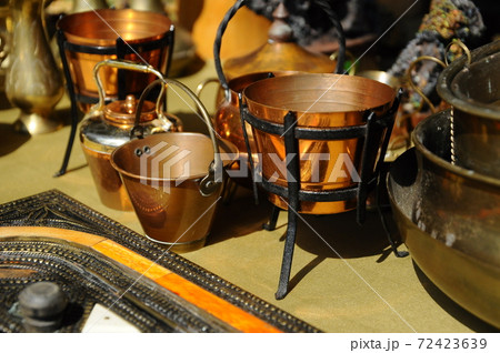 SEREMBAN, MALAYSIA -MAY 01, 2017: Old pottery made of copper widely used by the Malays. Displayed to the public. 72423639