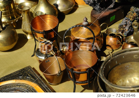 SEREMBAN, MALAYSIA -MAY 01, 2017: Old pottery made of copper widely used by the Malays. Displayed to the public. 72423646
