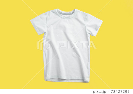 White T-shirt against Illuminating Yellow background, Color of the Year 2021 White T-shirt against Illuminating Yellow background, Color of the Year 2021 72427295