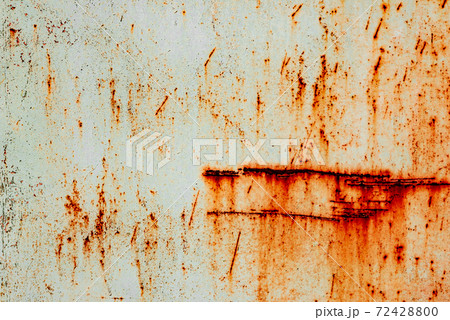 Metal texture with scratches and cracks which can be used as a background 72428800