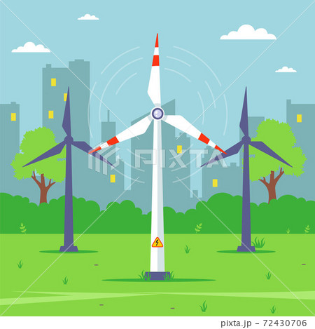 a windmill in the background of the city extracts electricity from the wind. 72430706