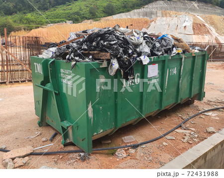KUALA LUMPUR, MALAYSIA -MARCH 13, 2020: Huge wasted disposal bin used to collect rubbish and unused material from the construction site. Has a fixed collection schedule 72431988