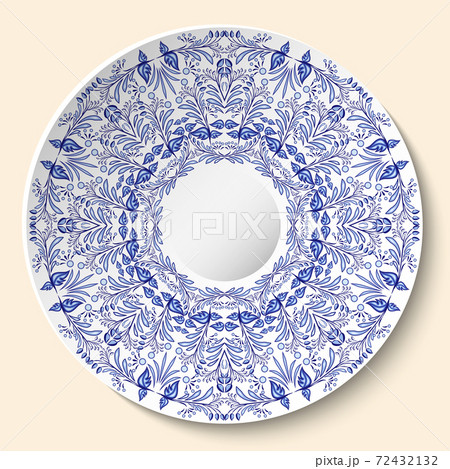 Round blue floral ornament. Styling based on Chinese or Russian porcelain painting. Pattern is applied to ceramic decorative plate. 72432132