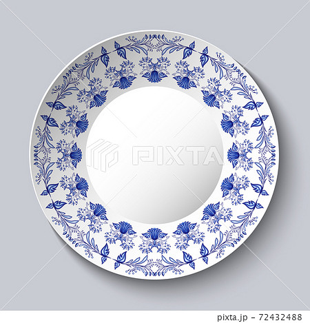 Ornamental porcellaneous plate with a blue pattern in ethnic style Chinese painting on porcelain or Russian style Gzhel. Ornamental porcellaneous plate with a blue pattern in ethnic style Chinese painting on porcelain or Russian style Gzhel. 72432488