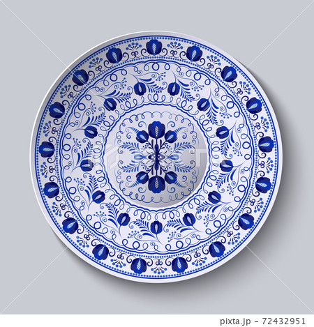 Porcelain plate with blue round ornament in ethnic style. Decorative pattern in the style of national flower painting. Ornate floral decor. Realistic 3D decor. Porcelain plate with blue round ornament in ethnic style. Decorative pattern in the style of national flower painting. Ornate floral decor. Realistic 3D decor. 72432951
