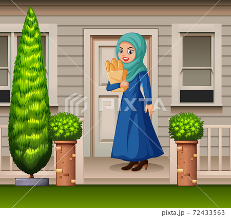 Arabian woman in front of the house 72433563