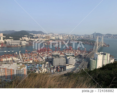 Kwai Tsing container terminal port view in drone, and hong kong skyline and stonecutter's bridge Kwai Tsing container terminal port view in drone, and hong kong skyline and stonecutter's bridge 72436882
