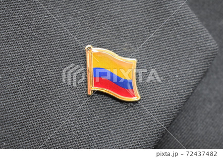 Columbia Flag lapel pin on a suit Columbia Flag lapel pin on a suit 72437482