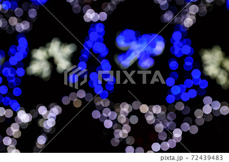 Festive multicolored blurred abstract background. Christmas lights bokeh background Festive multicolored blurred abstract background. Christmas lights bokeh background 72439483