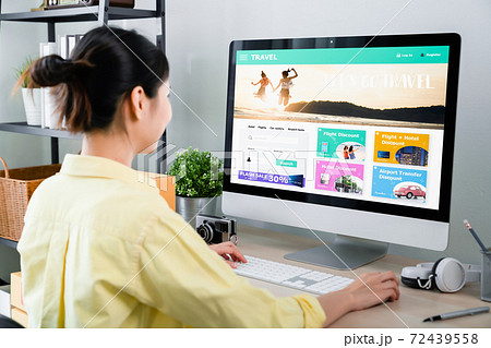 Woman using application booking flight travel search ticket holiday and hotel on website. Woman using application booking flight travel search ticket holiday and hotel on website. 72439558