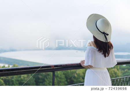 Woman at viewpoint. Woman at viewpoint. 72439698