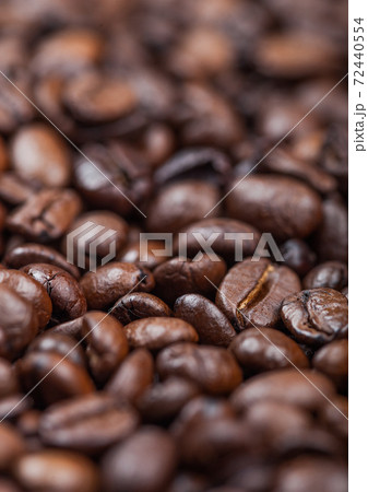 Close up fresh raw organic coffee beans top view background. 72440554