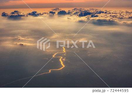 Golden river under cloud 72444595