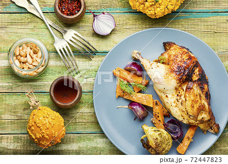 Roasted partridge with pumpkin Roasted partridge with pumpkin 72447823