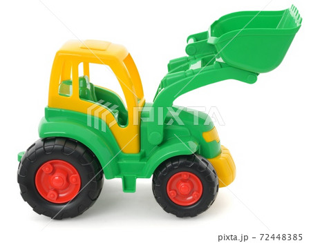 Children's plastic toy, yellow-green bulldozer isolated on white 72448385