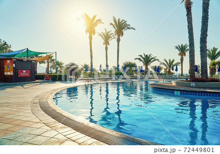 Pool and poolside of hotel on tropical resort Pool and poolside of hotel on tropical resort 72449801