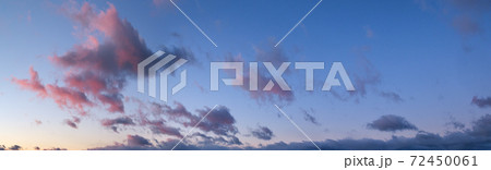 Fluffy clouds in evening overcast sky panoramic view. Climate, environment and weather concept sky background. 72450061