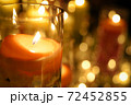 キャンドルナイトのろうそくと玉ぼけ 72452855