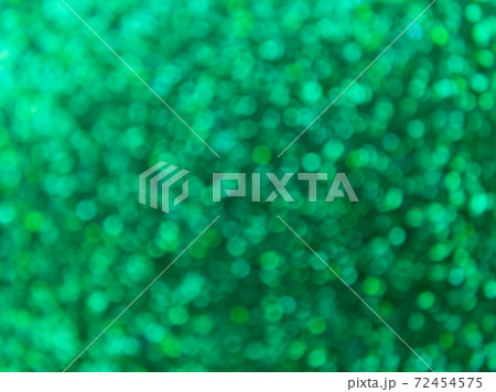 Green defocus lights background. Festive abstract bokeh. Green defocus lights background. Festive abstract bokeh. 72454575