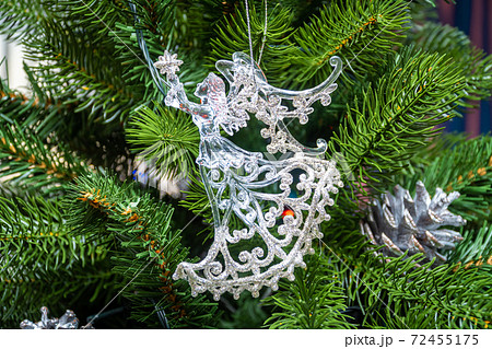 Russia. Saint-Petersburg. Christmas tree decoration in the form of a transparent glowing angel. 72455175