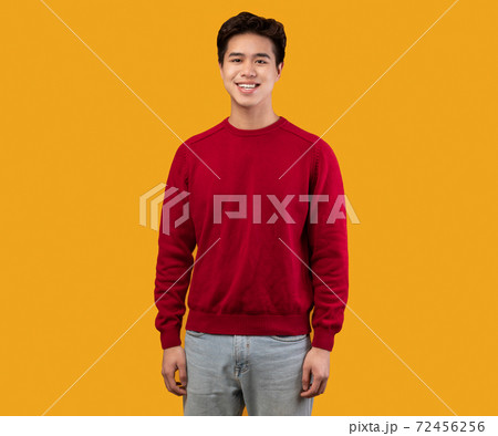 Portrait of attractive asian teen guy posing at studio Portrait of attractive asian teen guy posing at studio 72456256